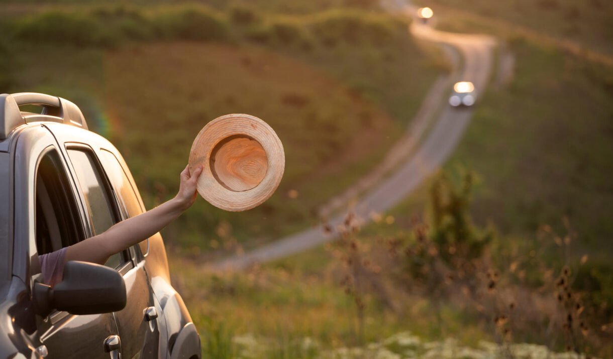 girl with hat in the window of the car adventure 2024 06 11 17 20 32 utc easy resize.com